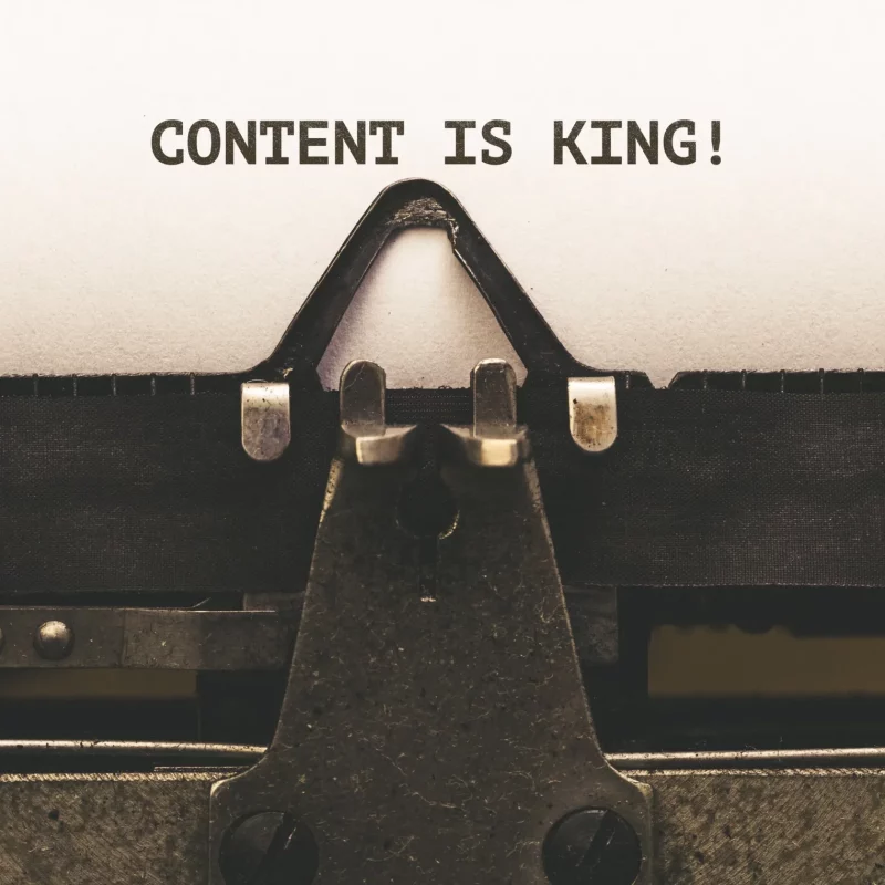 content-is-king-message-on-paper-in-old-typewriter-2021-10-12-14-03-25-utc-2-2-scaled.webp